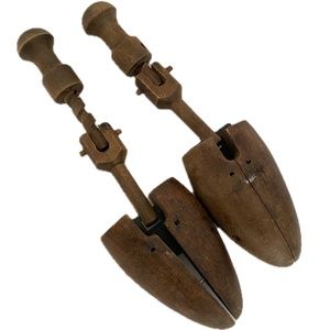 Vintage wooden brown shoe stretcher with screw mechanism